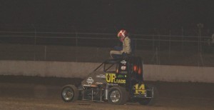 Michael Harders dismounting from the #14 car